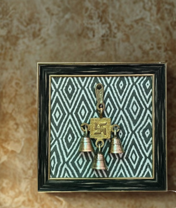 Swastik brass wall hanging